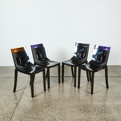 A Set of Four Hi-Cut Dining Chairs by Philippe Starck