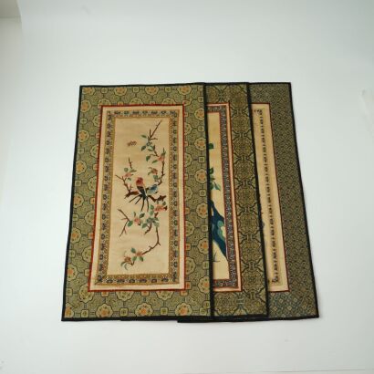 A Set of Three Chinese Embroidered Floral and Bird Textile Panels