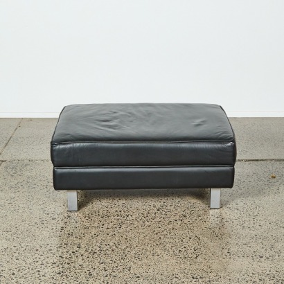 A Leather Skagen Ottoman by Bromhead Design