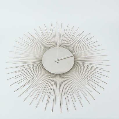 A Stainless Steel 'Starburst' Wall Clock
