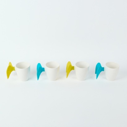 A Set of Four Pylones Mugs by Green & Associates