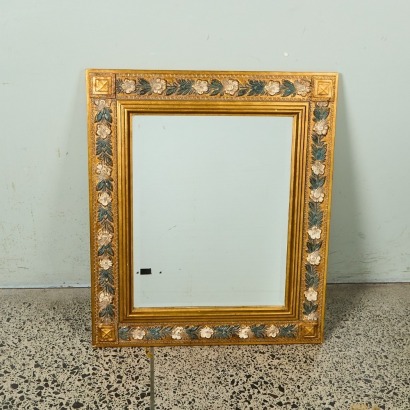An Ornate Gold Framed Mirror
