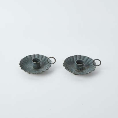 A Pair of Fluted Metal Candle Holders