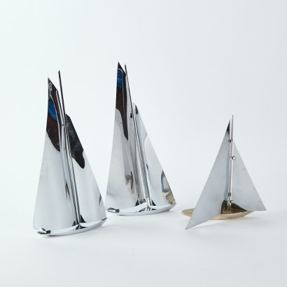 A Trio of Vintage Chrome Yachts