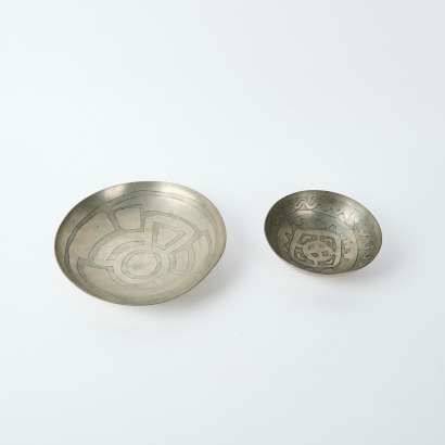 A Pair of Signed Jane Calcutt Pewter Plates