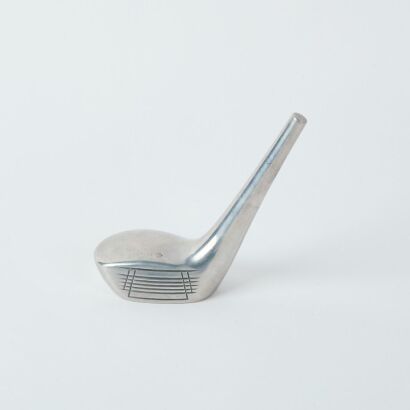 An Aluminium Golf Club Paperweight