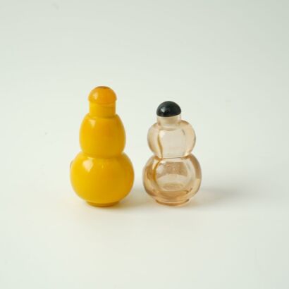 A Chinese Yellow Glass Snuff Bottle AND A Chinese Transparent Glass Snuff Bottle