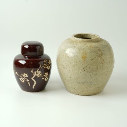 A Chinese Qing Dynasty Celadon-glazed Jar AND A Persimmon-glazed Carved Lidded Jar