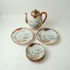 A Japanese Late Meiji Period Kyushu Ware Figural Teapot AND Three Dishes