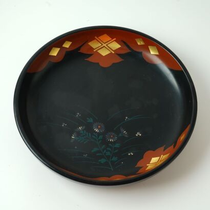 A Japanese Gilt-decorated Black Lacquer Floral Dish