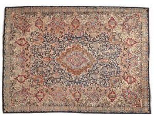 A Large Hand Knotted Persian Carpet