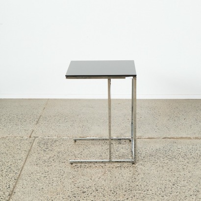 A Minimalist Glass and Metal Side Table