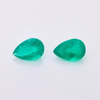 One 1.71ct, Matching Loose Pair of Pear Cut Colombian Emeralds