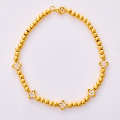 18ct Yellow Gold Bracelet with 24ct Yellow Gold, 3.5mm Beads / .20ct Diamond Set Flower Links