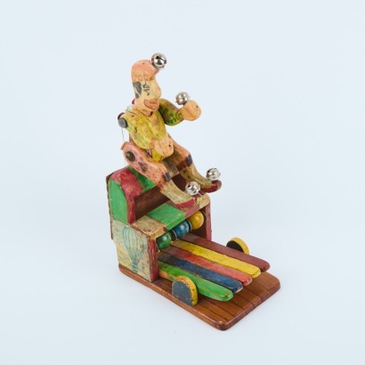 A Vintage Dancing Clown Toy