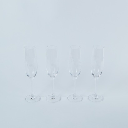 A Set of Four Royal Doulton Verre Crystal Champagne Flutes