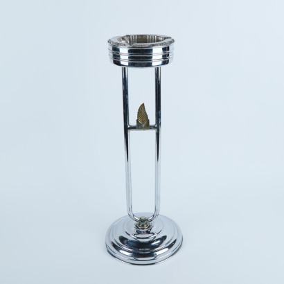 An Art Deco Free Standing Ashtray With A Glass Insert And Fern Matchstick Holder