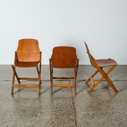A Set of Three Storkline Folding Wooden Chairs
