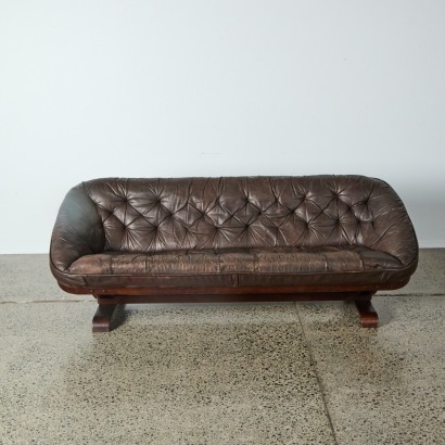A Vintage Danish Beaten Brown Leather And Rosewood Sling Sofa