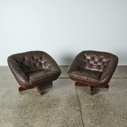 A Pair Of Vintage Danish Beaten Brown Leather And Rosewood Sling Chairs