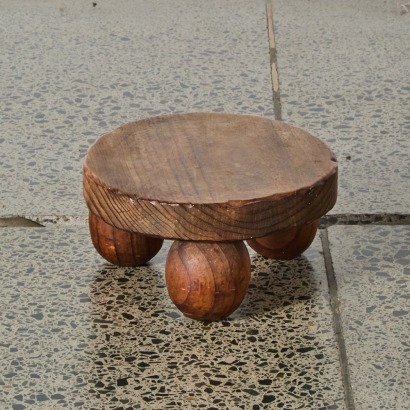 A Vintage Stool With Chubby Feet