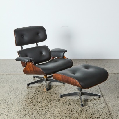 A Vintage Eames Style Lounge Chair & Ottoman. c. 1980s
