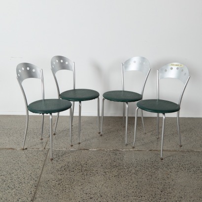 A Suite of Four Cavit And Company Italian Chairs