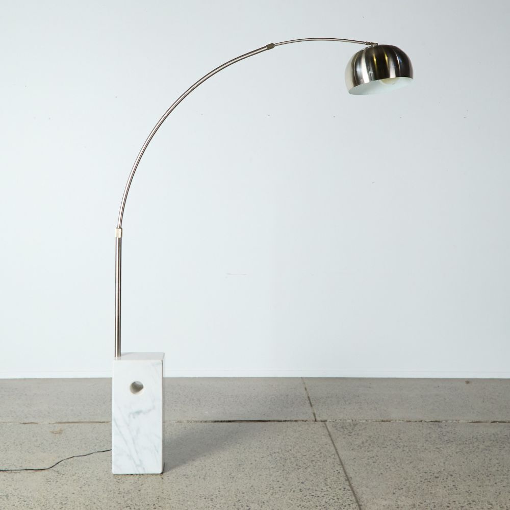 An Arco Style Floor Lamp With Natural Marble Base