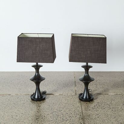 A Pair of Black Sculptural Lamps