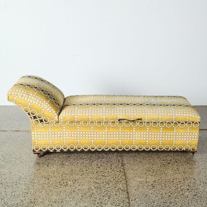 A Mid-Century Chaise Lounge with Lift Up Storage