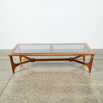 A Large Glass Topped Coffee Table