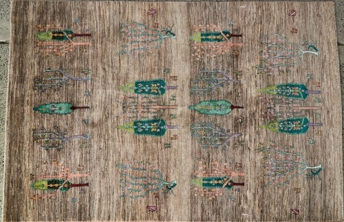 A Handwoven Wool Loribaft Rug
