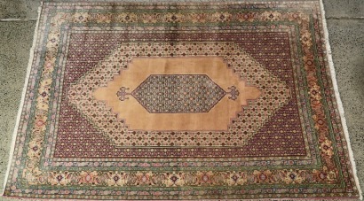 A Handwoven Wool Senneh Rug