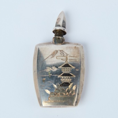 A Sterling Silver Perfume Bottle With Cap And Dabber