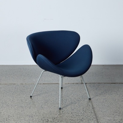 An Orange Slice Chair In Blue