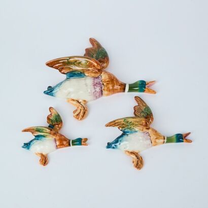 A Set of Three Beswick Porcelain Flying Ducks