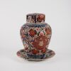 A Japanese Meiji Period Imari Lidded Jar and An Imari Dish