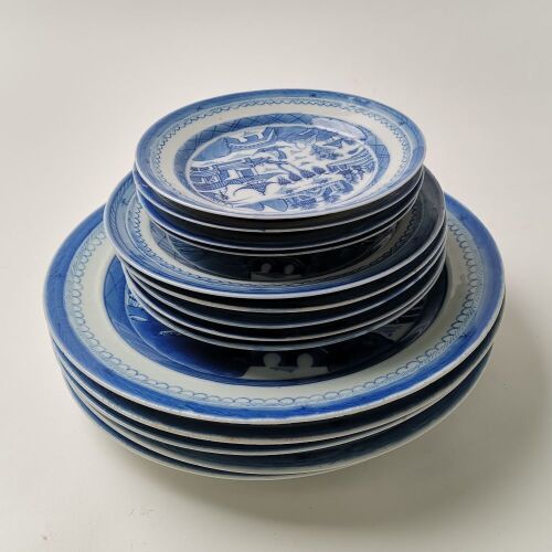 A Group of Fourteen Chinese Qing Dynasty Blue and White 'Landscape' Dishes
