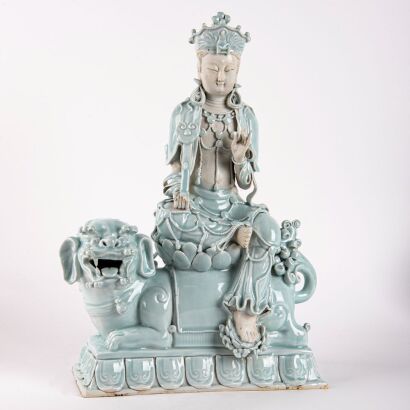 A Chinese Jingdezhen Qingbai 'Guanyin Seated on a Lion'