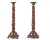 A Pair of Spiral Turned Mahogany Candlesticks