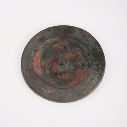 A Chinese Han Dynasty Bronze Mirror with Four Auspicious Beasts