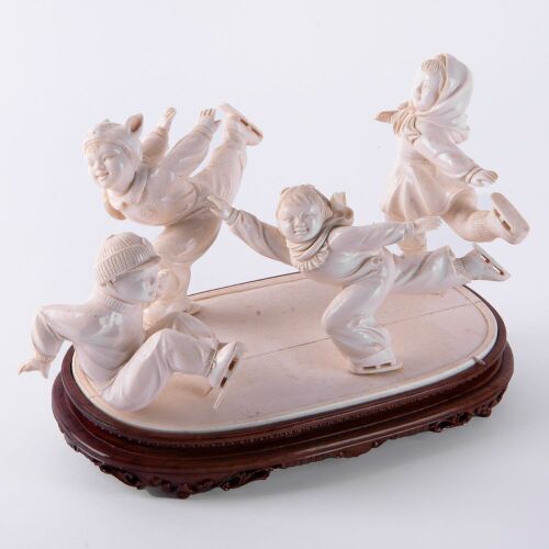 A Chinese 20th Century Cultural Revolution Period Ivory Carving of Children Ice Skating