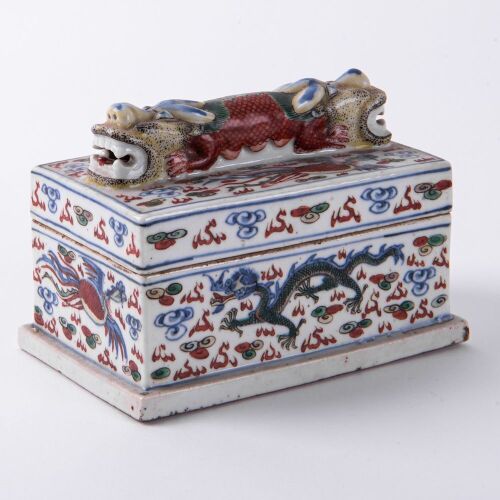 A Chinese Ming or Qing Dynasty Blue and White Iron-Red and Green Enamel Dragons Covered Box