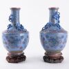 A Pair of Chinese Republic Period Lavender-glazed Ground Famille-rose &lsquo;Dragon and Chilong&rsquo; Vases