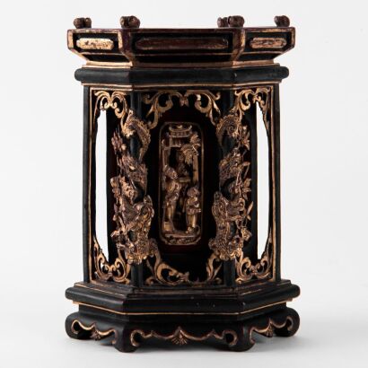 A Chinese Qing Dynasty Carved Wooden Figural and Dragon Shrine of Buddha