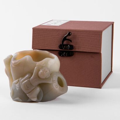 A Chinese Qingbai Jade Lotus and Boy Brush Washer
