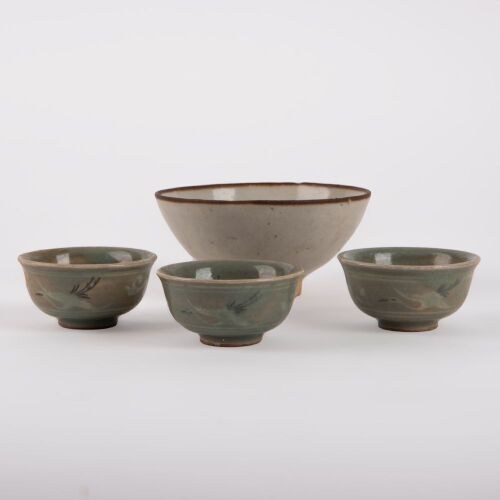 A Korean 13th to 14th Century Goryeo Dynasty White-glazed Small Bowl AND A Group of Three Celadon-glazed Small Cups