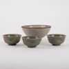 A Korean 13th to 14th Century Goryeo Dynasty White-glazed Small Bowl AND A Group of Three Celadon-glazed Small Cups