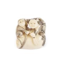A Modern Netsuke Depicting A Man with Monkey.&nbsp;