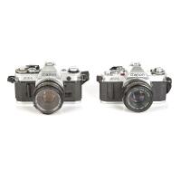 CANON (Japan): Two 35mm SLR Cameras